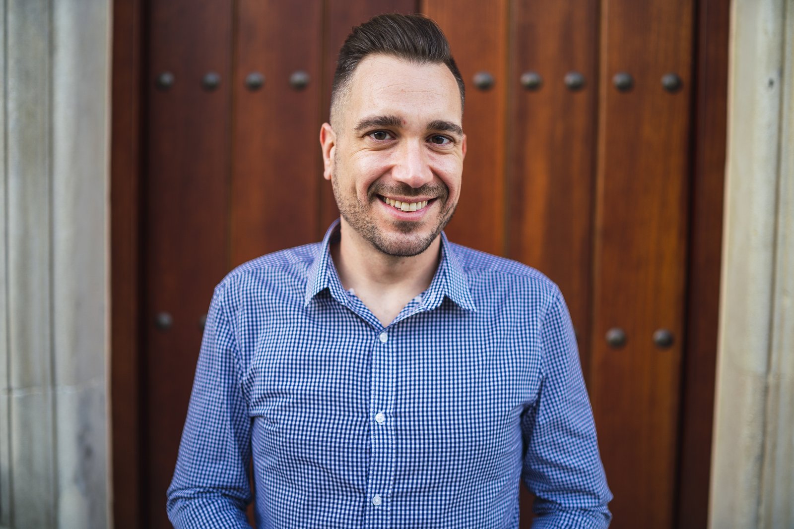 jason smiling at the camera